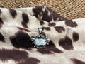Sterling Silver White Buff Pendant